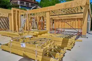 Construction maison poutres a grandes portées ajourées