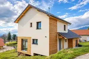 Maison bois crépi et bardage charpente traditionnelle Oreléans